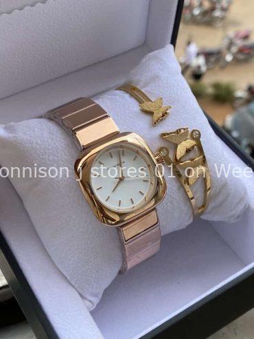 The rose gold ,black, gold ,gold black face ladies watch