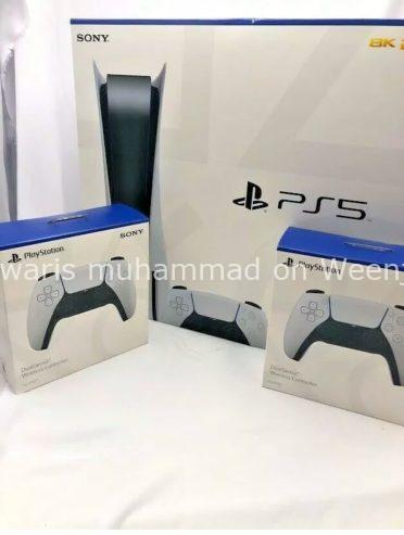 Sony PlayStation 5 console with two controllers